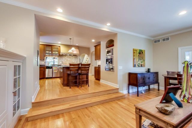 416 Wisner Street Park Ridge, IL 60068 - Photo 15 of 49 a living room with furniture and a table with kitchen view