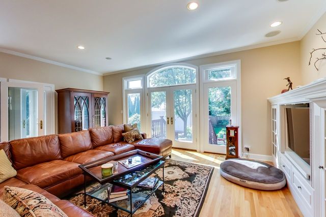 416 Wisner Street Park Ridge, IL 60068 - Photo 16 of 49 a living room with fireplace furniture and a flat screen tv