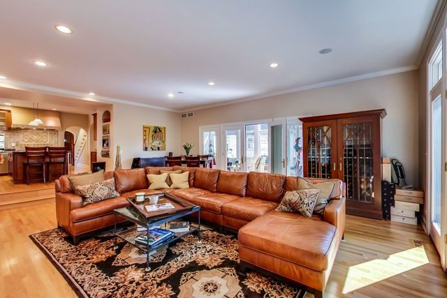 416 Wisner Street Park Ridge, IL 60068 - Photo 17 of 49 a living room with furniture fireplace and a table