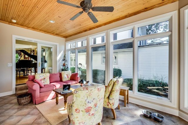416 Wisner Street Park Ridge, IL 60068 - Photo 21 of 49 a living room with furniture and a floor to ceiling window