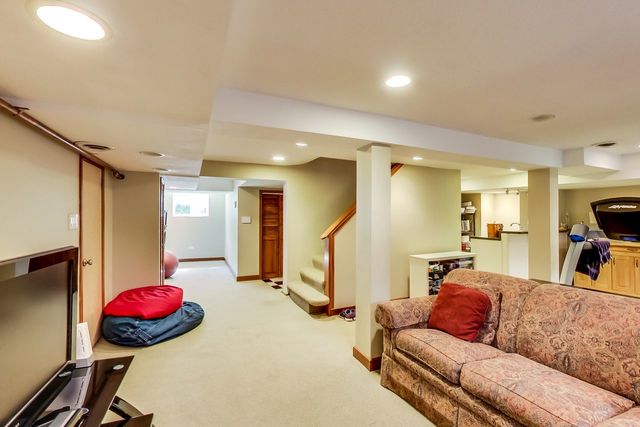 416 Wisner Street Park Ridge, IL 60068 - Photo 40 of 49 a living room with furniture and a wooden floor