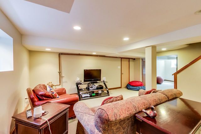 416 Wisner Street Park Ridge, IL 60068 - Photo 41 of 49 a bedroom with furniture and a flat screen tv