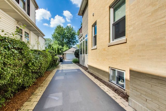 416 Wisner Street Park Ridge, IL 60068 - Photo 44 of 49 a view of a pathway along the building
