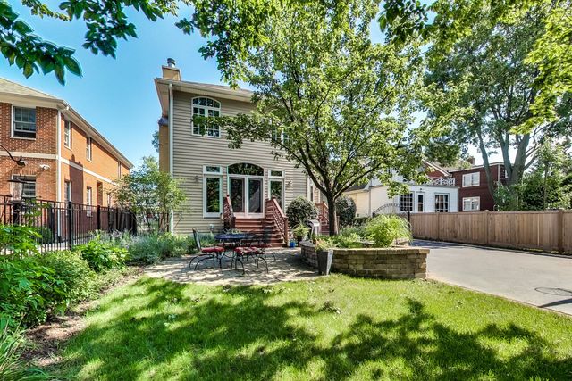 416 Wisner Street Park Ridge, IL 60068 - Photo 49 of 49 a view of a house with a yard patio and a small yard