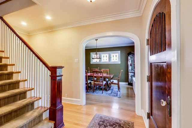 416 Wisner Street Park Ridge, IL 60068 - Photo 6 of 49 a view of a hallway with wooden floor and windows