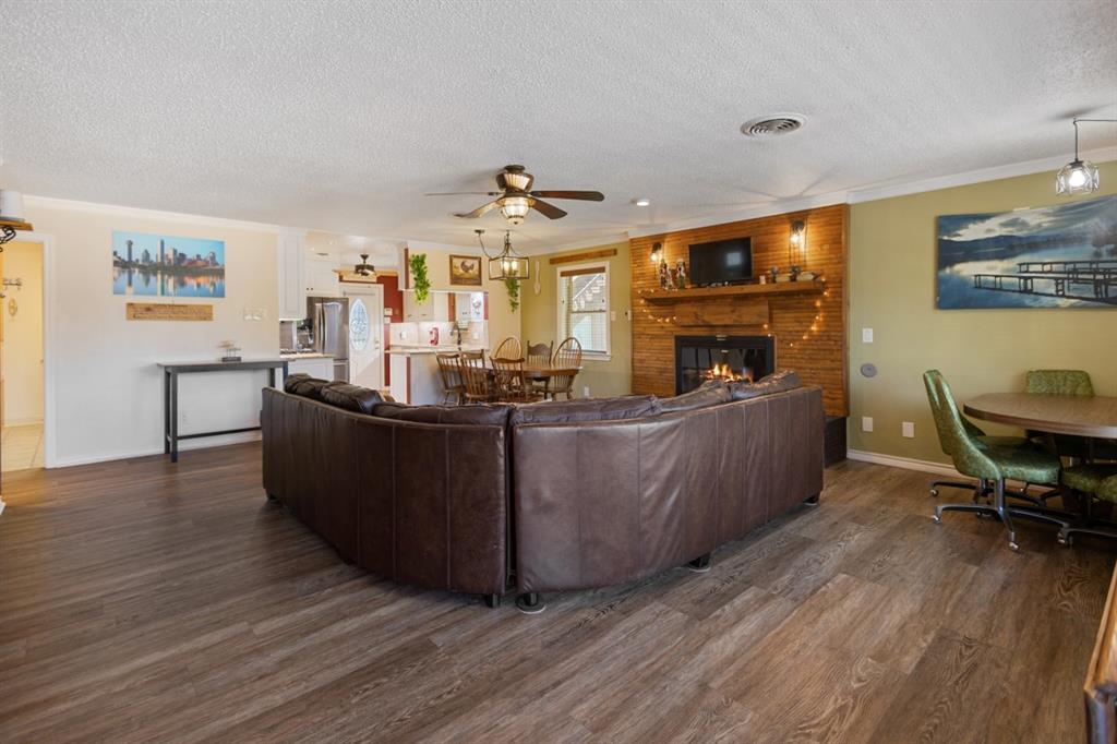 227 Scenic Road Trinidad, TX 75163 - Photo 12 of 40 a living room with furniture and fireplace
