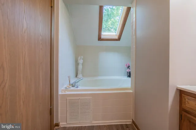 a bathroom with a bathtub