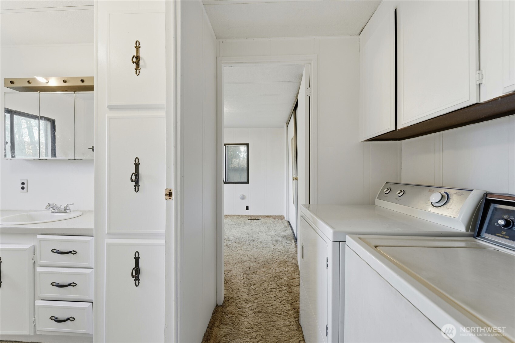269 7 Mile Road Walla Walla, WA 99362 - Photo 16 of 40 a utility room with closet dryer and washer