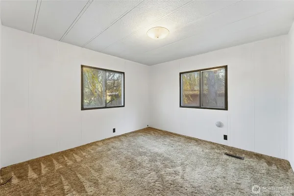 a view of an empty room with window