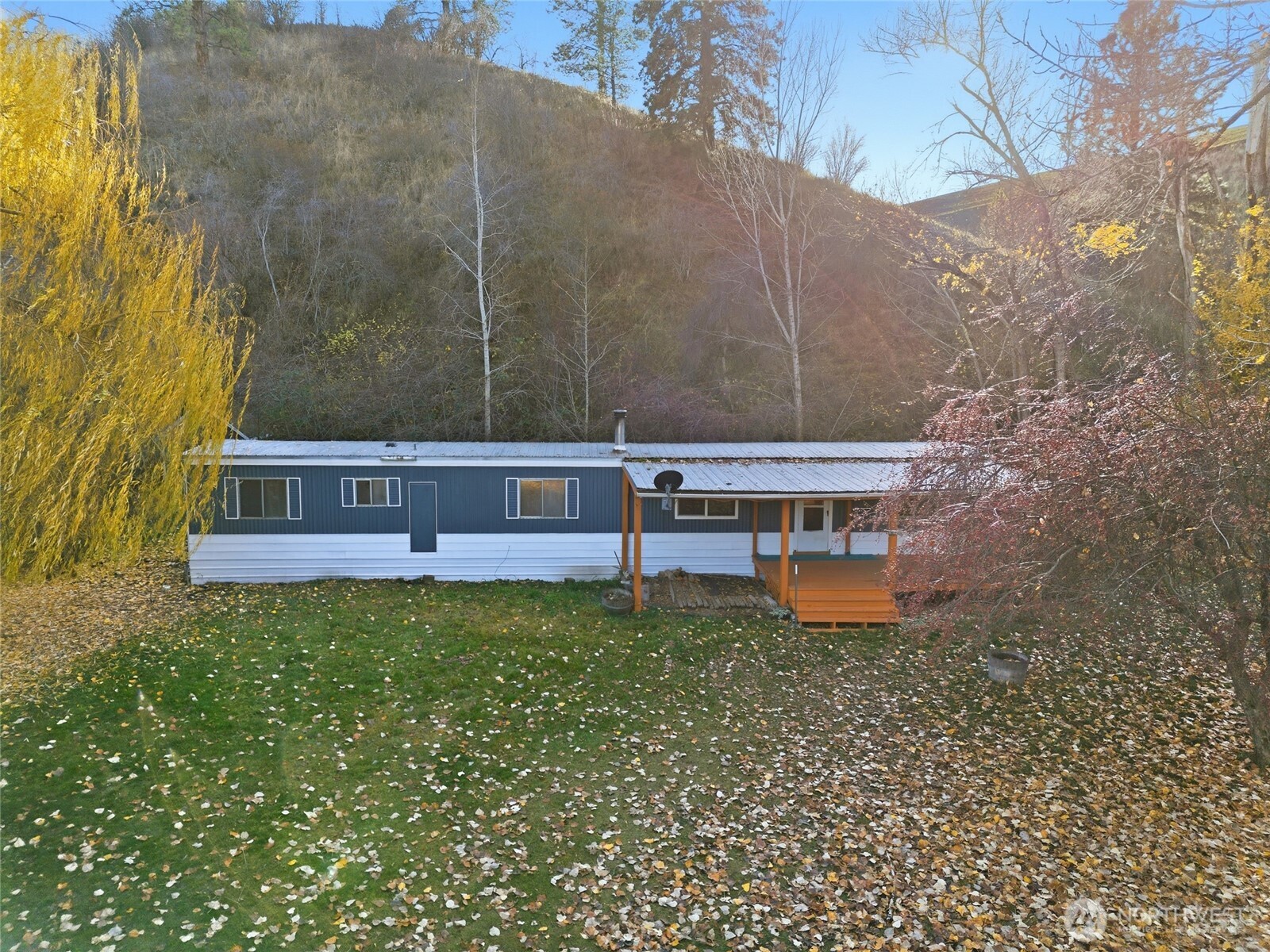 269 7 Mile Road Walla Walla, WA 99362 - Photo 38 of 40 a view of a back yard of the house with a bench