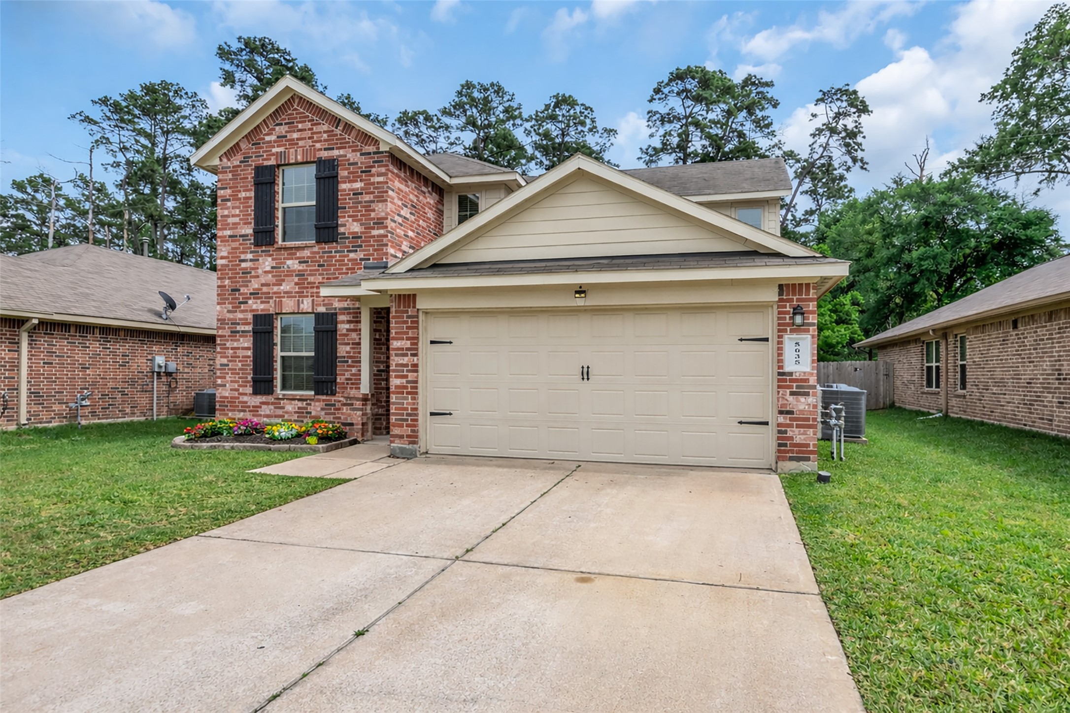 5635 Rainflower Terrace Lane Spring, TX 77389 - Photo 44 of 46 - Flowers have been added to this enhanced photo.