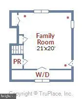 a view of a house with a yard and potted plants