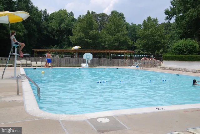 a house with trees in the background