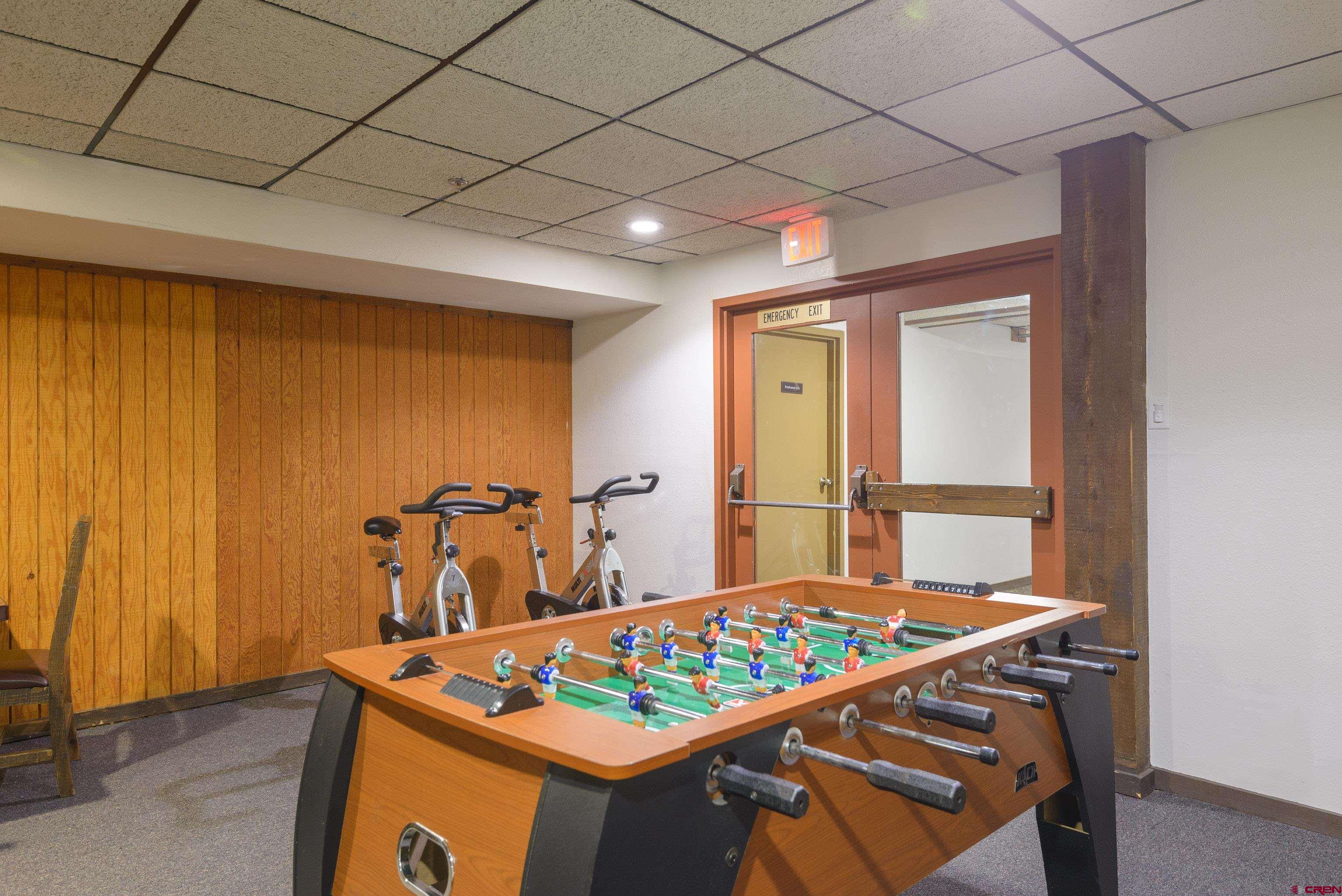 701 Gothic Road, Unit 306 Crested Butte, CO 81225 - Photo 19 of 25 a room with table and chairs