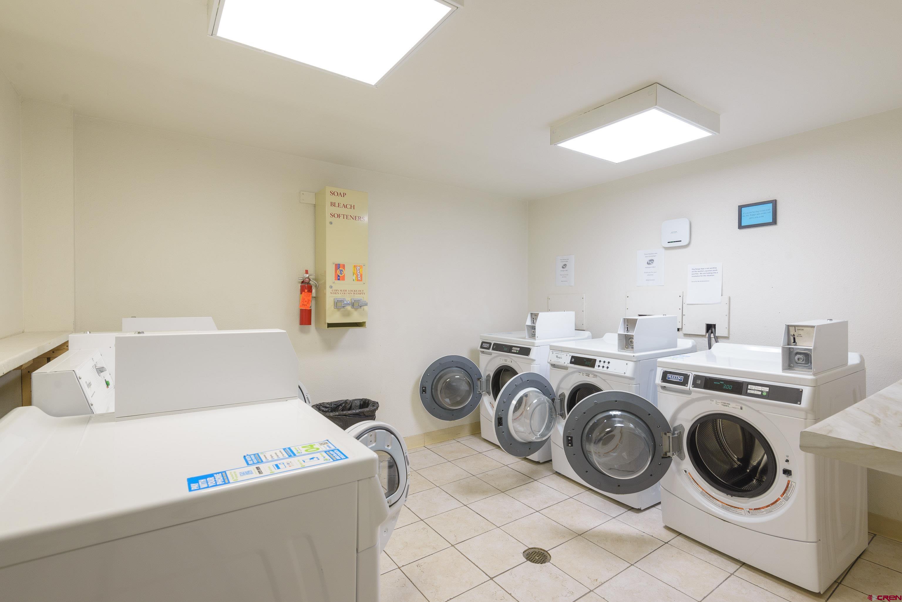 701 Gothic Road, Unit 306 Crested Butte, CO 81225 - Photo 20 of 25 a utility room with dryer and washer