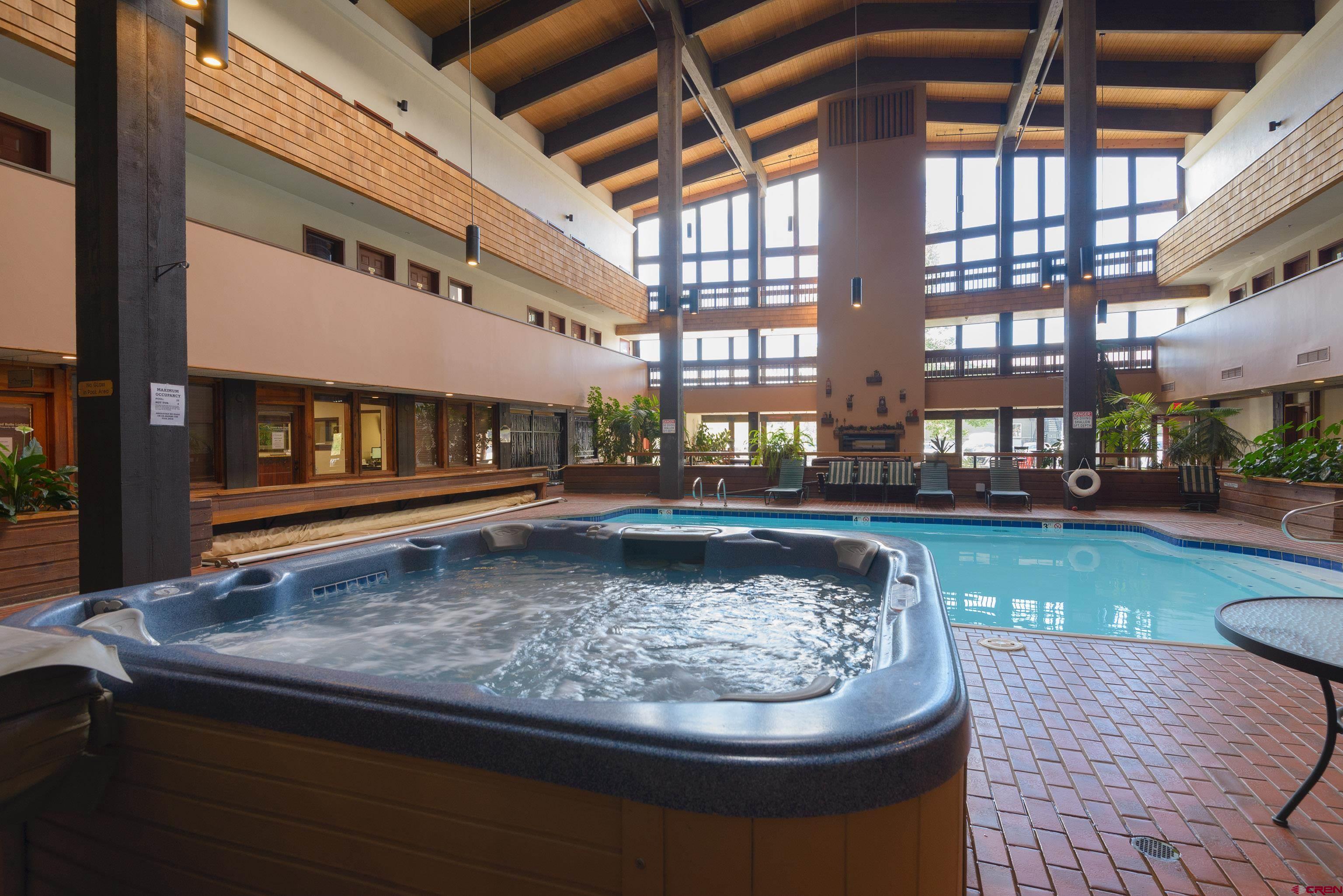 701 Gothic Road, Unit 306 Crested Butte, CO 81225 - Photo 25 of 25 a view of a swimming pool with a patio