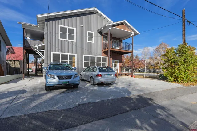 a car parked in front of a house