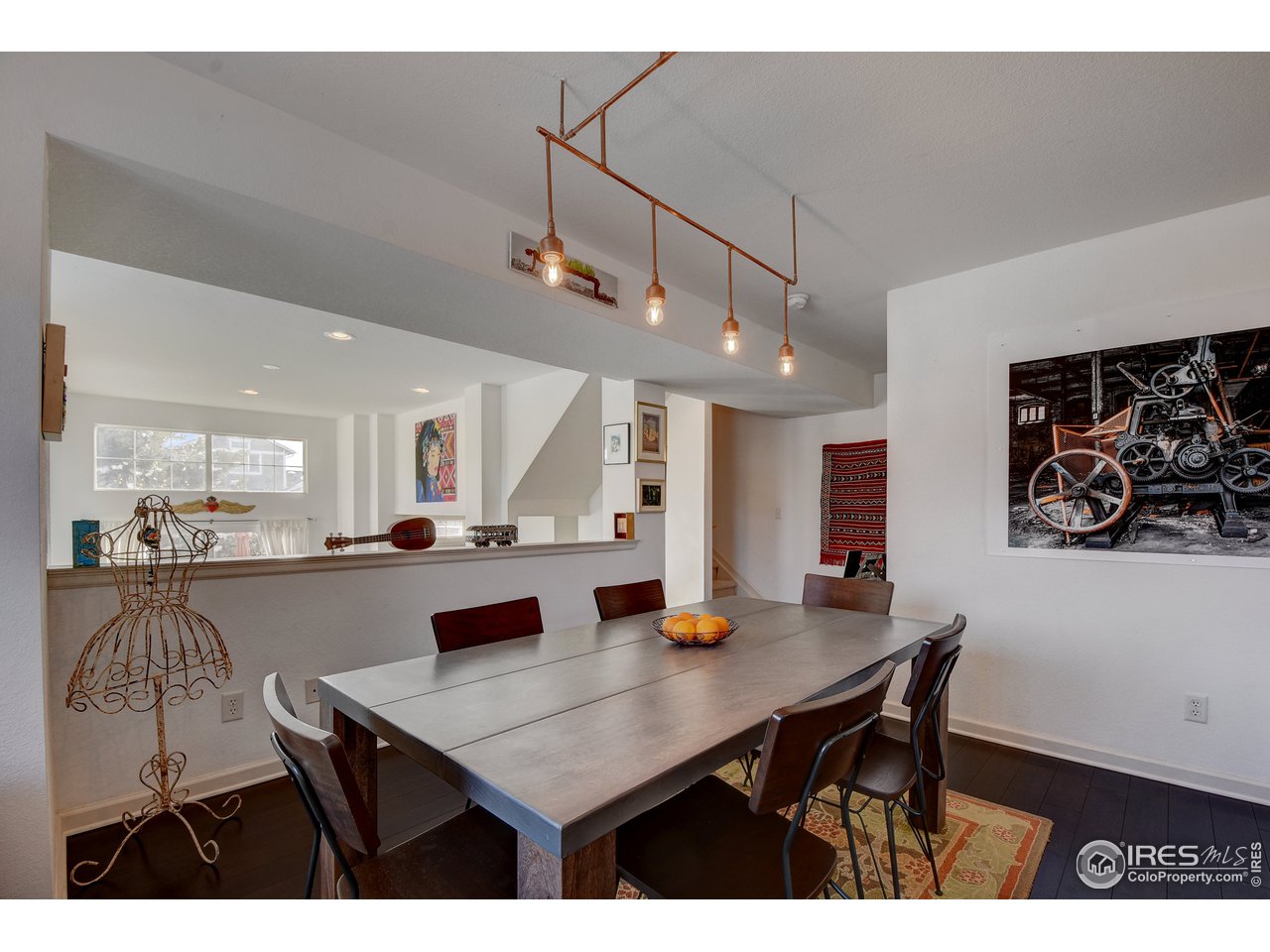 4222 Riley Drive Longmont, CO 80503 - Photo 10 of 40 Dining overlooks living room.