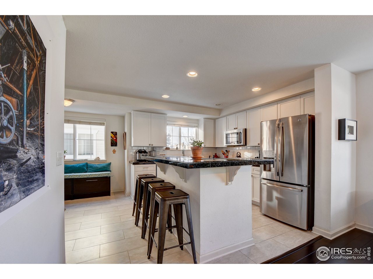 4222 Riley Drive Longmont, CO 80503 - Photo 11 of 40 Kitchen island bar.