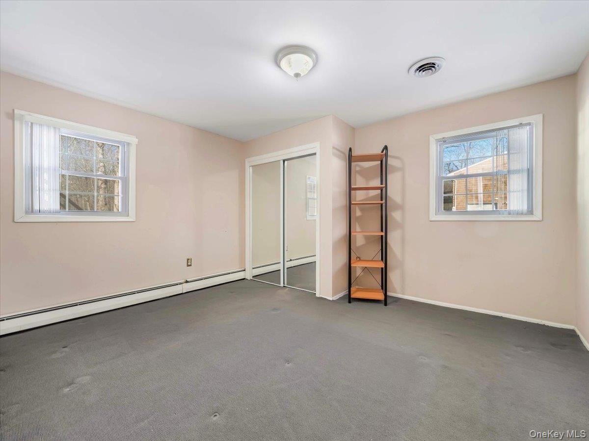 13 Razel Avenue Spring Valley, NY 10977 - Photo 34 of 43 a view of an empty room with a window
