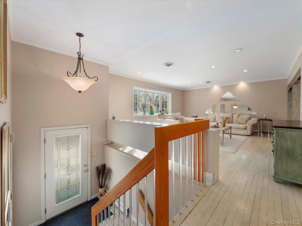 13 Razel Avenue Spring Valley, NY 10977 - Photo 4 of 43 a view of a dining room with furniture wooden floor and chandelier