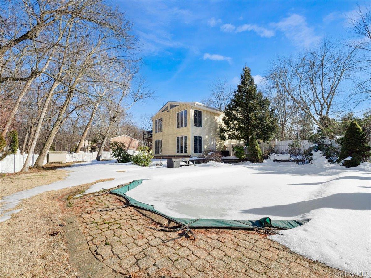 13 Razel Avenue Spring Valley, NY 10977 - Photo 41 of 43 a view of a house with snow on the ground