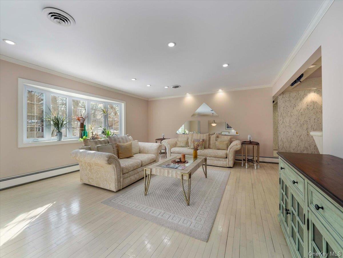 13 Razel Avenue Spring Valley, NY 10977 - Photo 5 of 43 a living room with furniture and a large window
