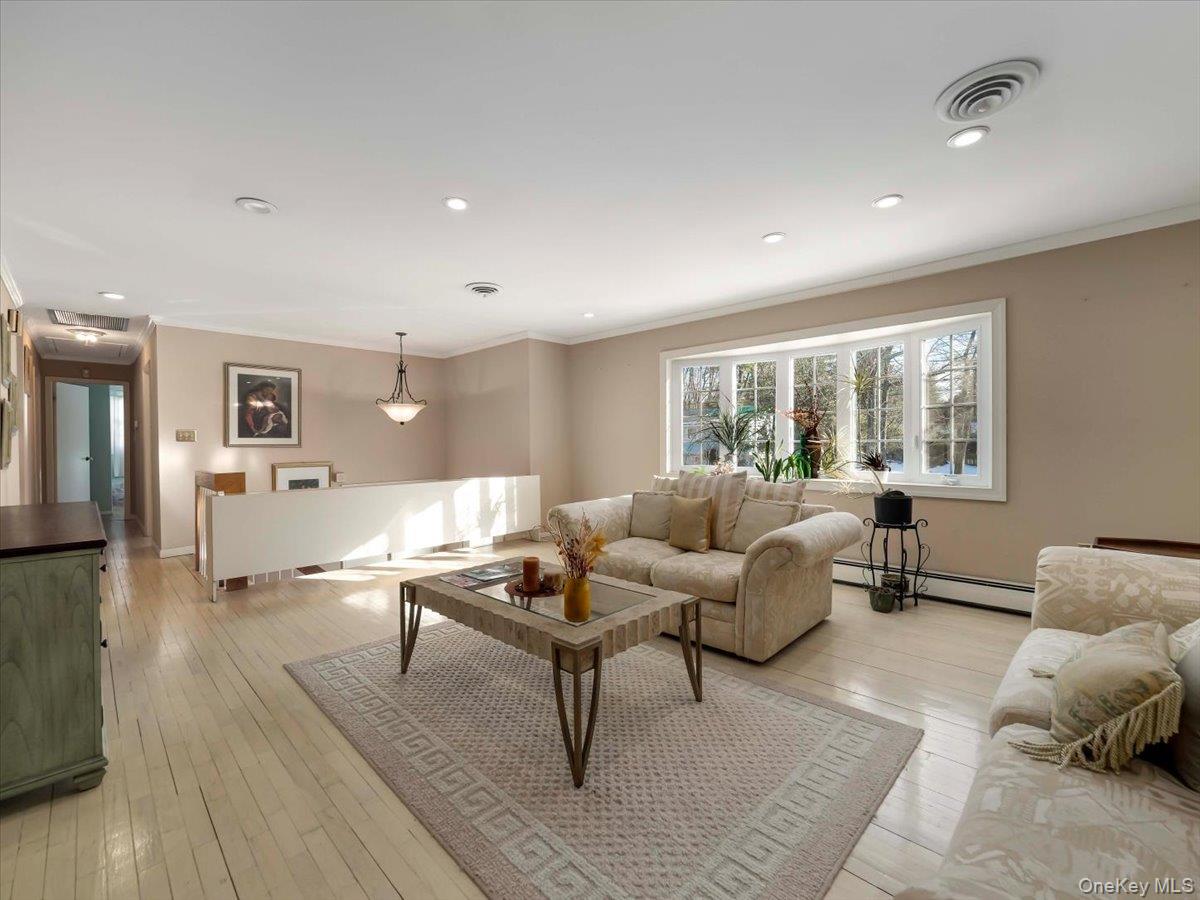 13 Razel Avenue Spring Valley, NY 10977 - Photo 7 of 43 a living room with furniture and wooden floor
