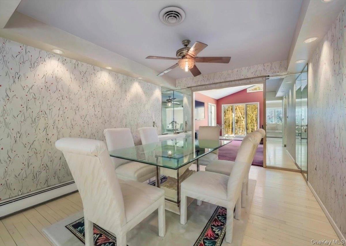 13 Razel Avenue Spring Valley, NY 10977 - Photo 9 of 43 a view of a dining room with furniture window and outside view