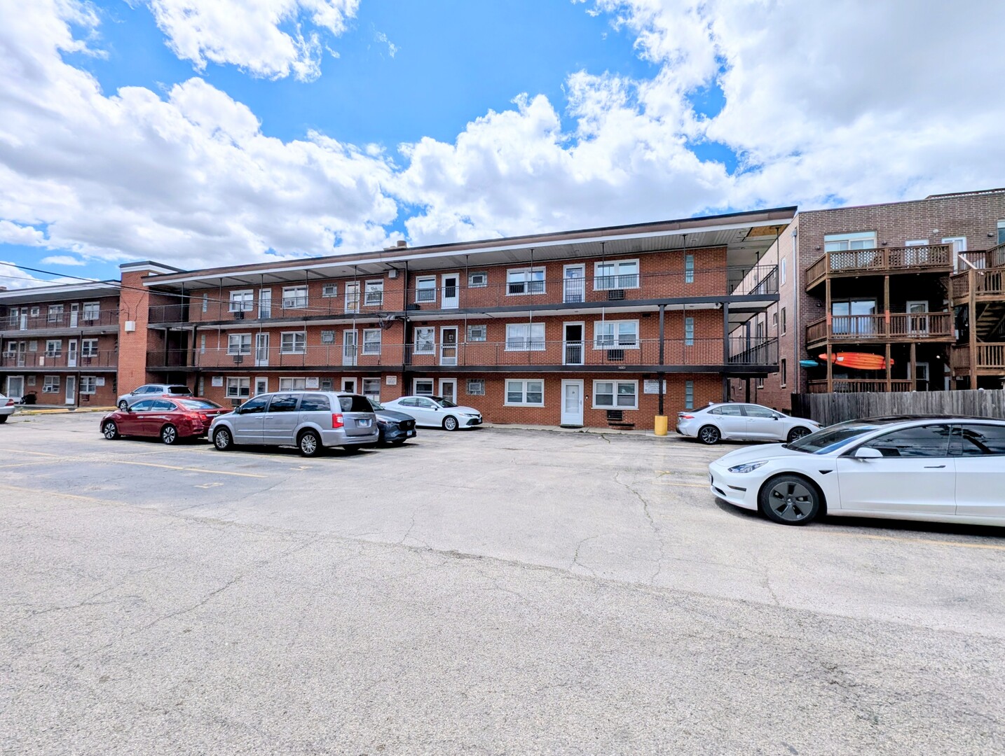 4229 North Keystone Avenue, Unit 3H Chicago, IL 60641 - Photo 22 of 22 a car parked in front of a building