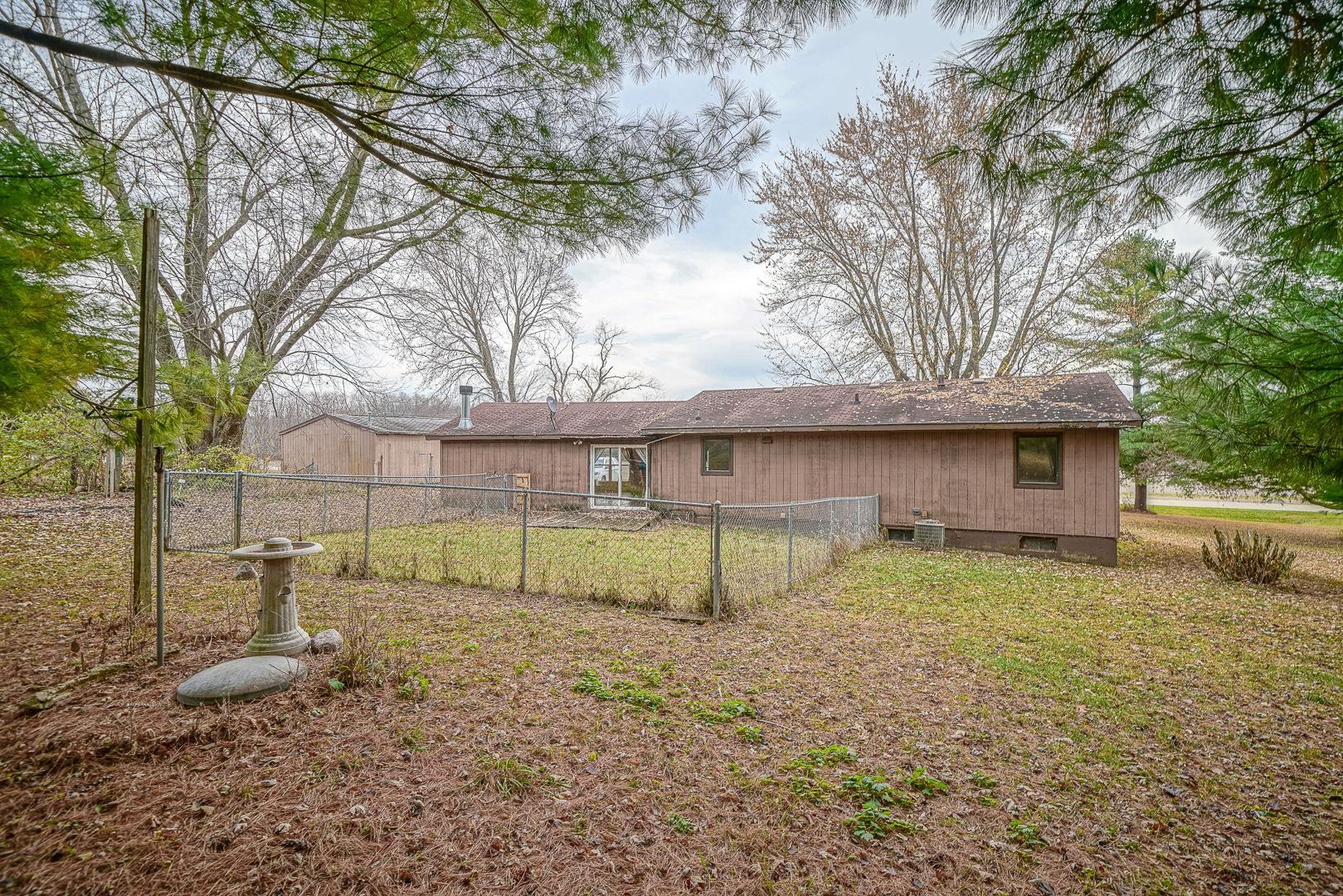 8330 North Kishwaukee Road Stillman Valley, IL 61084 - Photo 26 of 37 a house view with backyard space