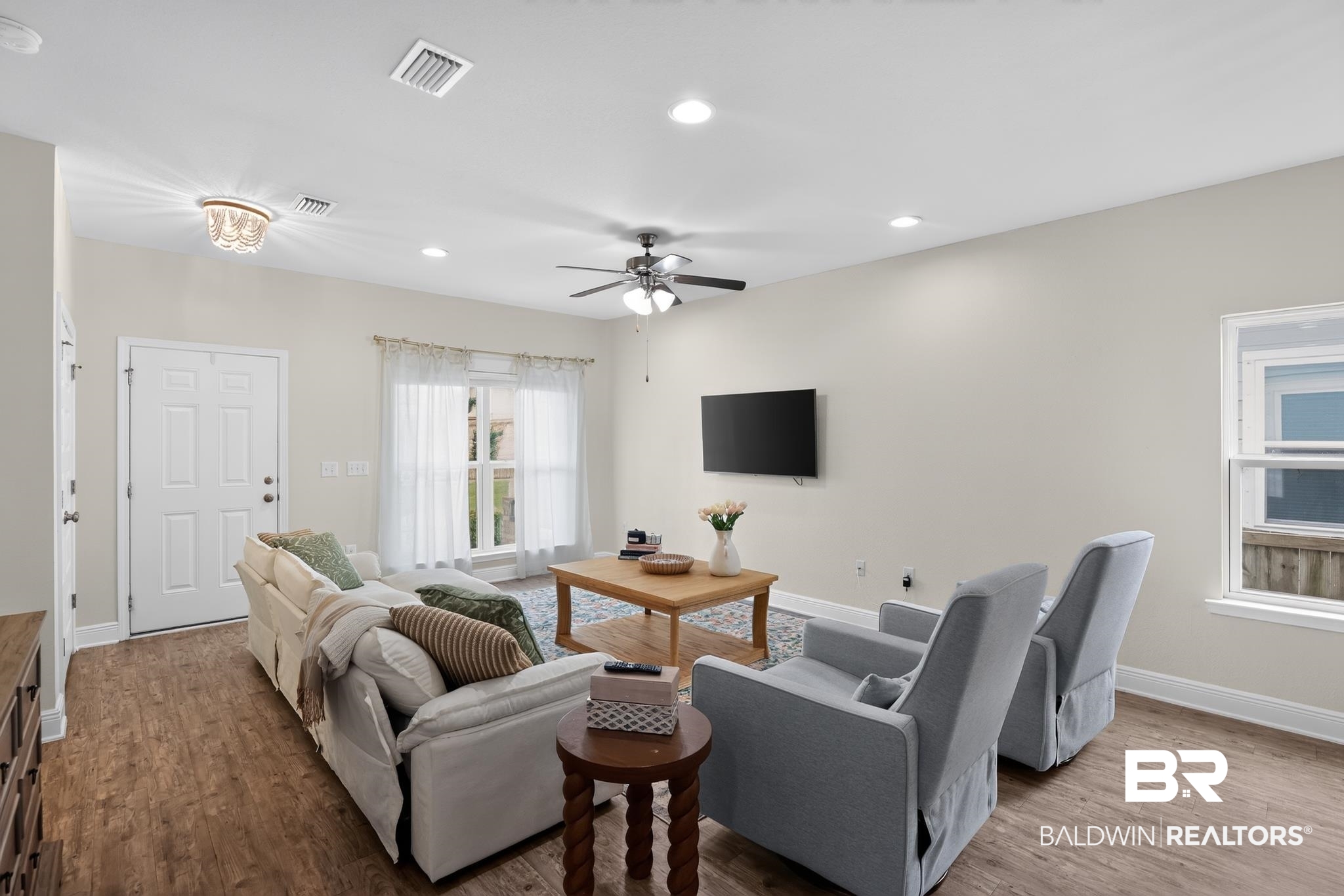 1210 Primrose Lane Foley, AL 36535 - Photo 7 of 33 Living area featuring wood-finish flooring, recessed lighting, and a ceiling fan