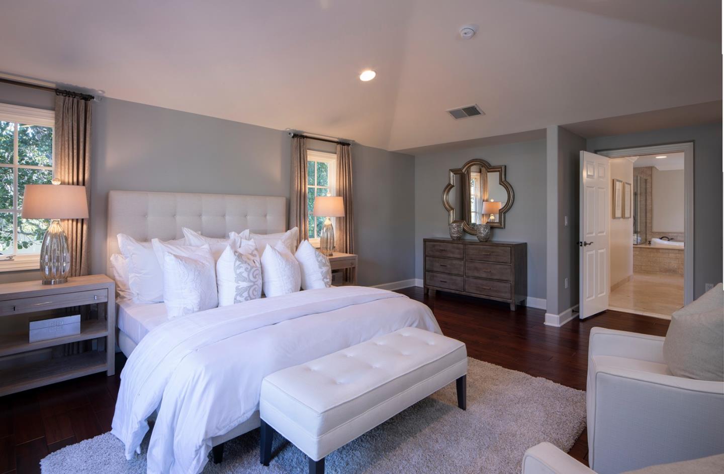 158 Seminary Drive Menlo Park, CA 94025 - Photo 12 of 23 a spacious bedroom with a bed and a couch