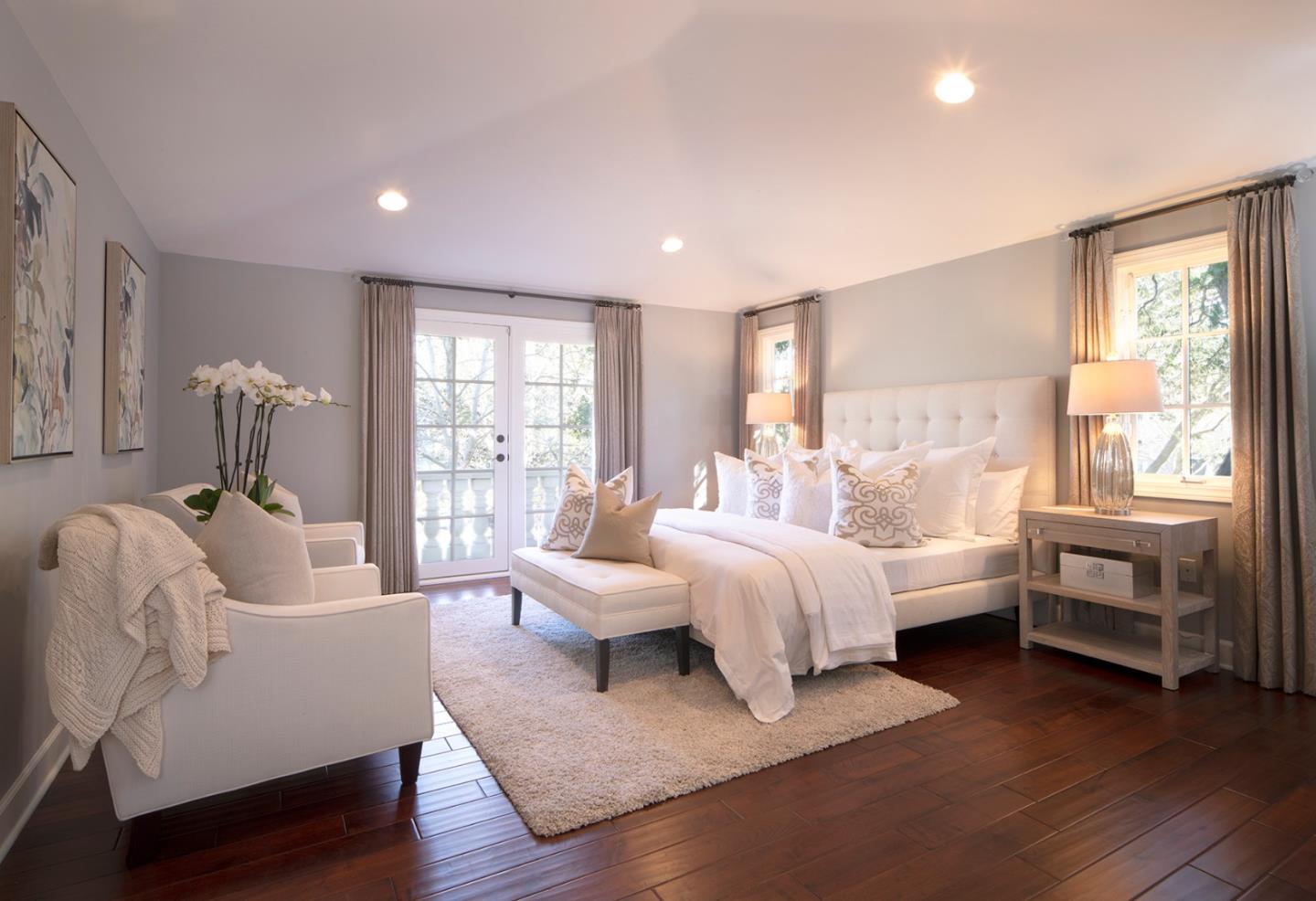 158 Seminary Drive Menlo Park, CA 94025 - Photo 13 of 23 a spacious bedroom with a bed and a large window