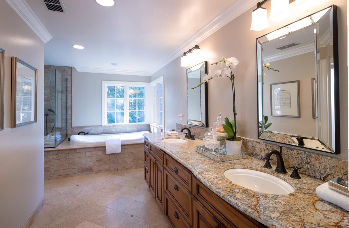158 Seminary Drive Menlo Park, CA 94025 - Photo 14 of 23 a bathroom with a granite countertop double vanity sink and a bathtub