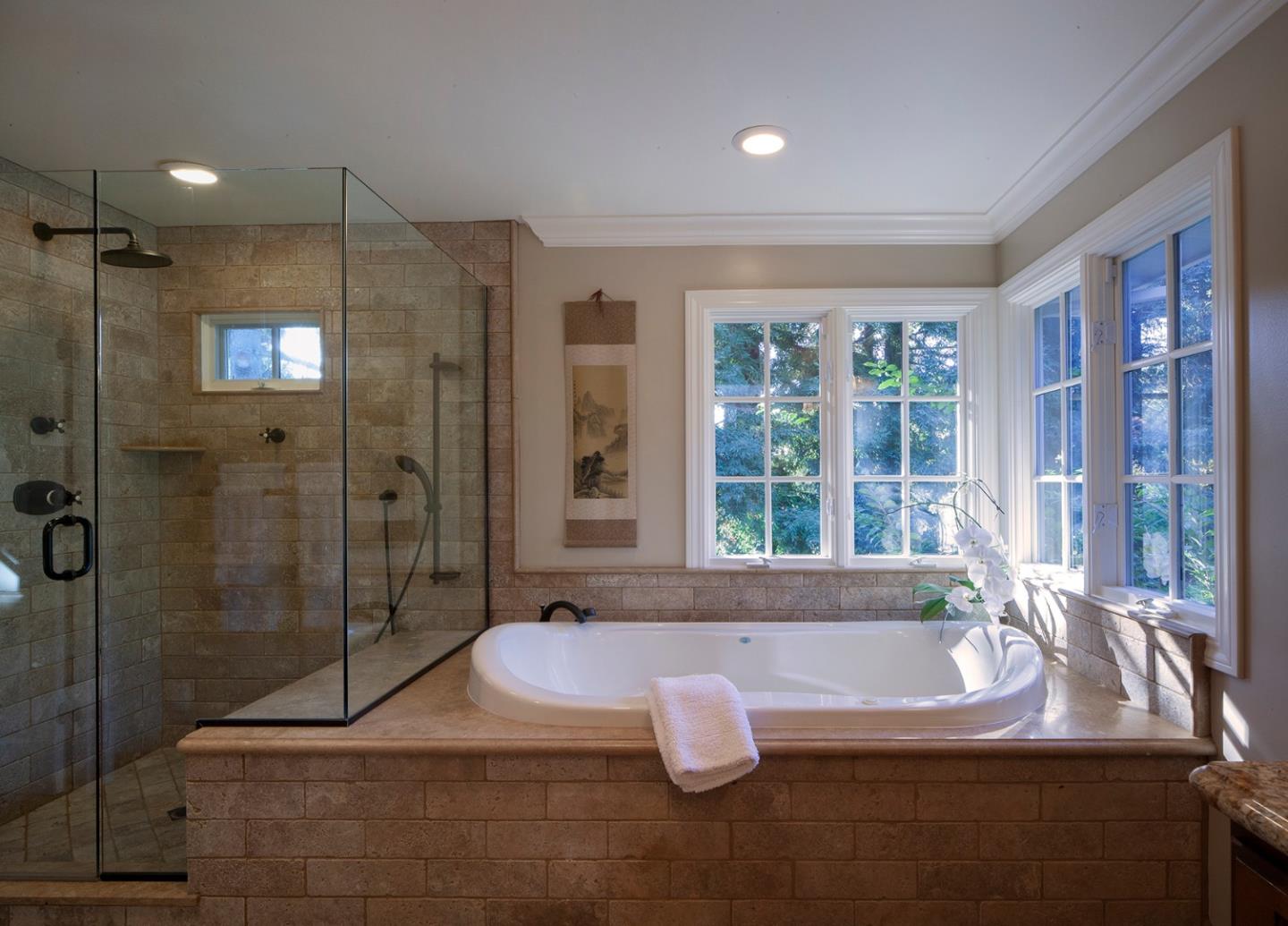 158 Seminary Drive Menlo Park, CA 94025 - Photo 16 of 23 a bathroom with a bathtub and a shower