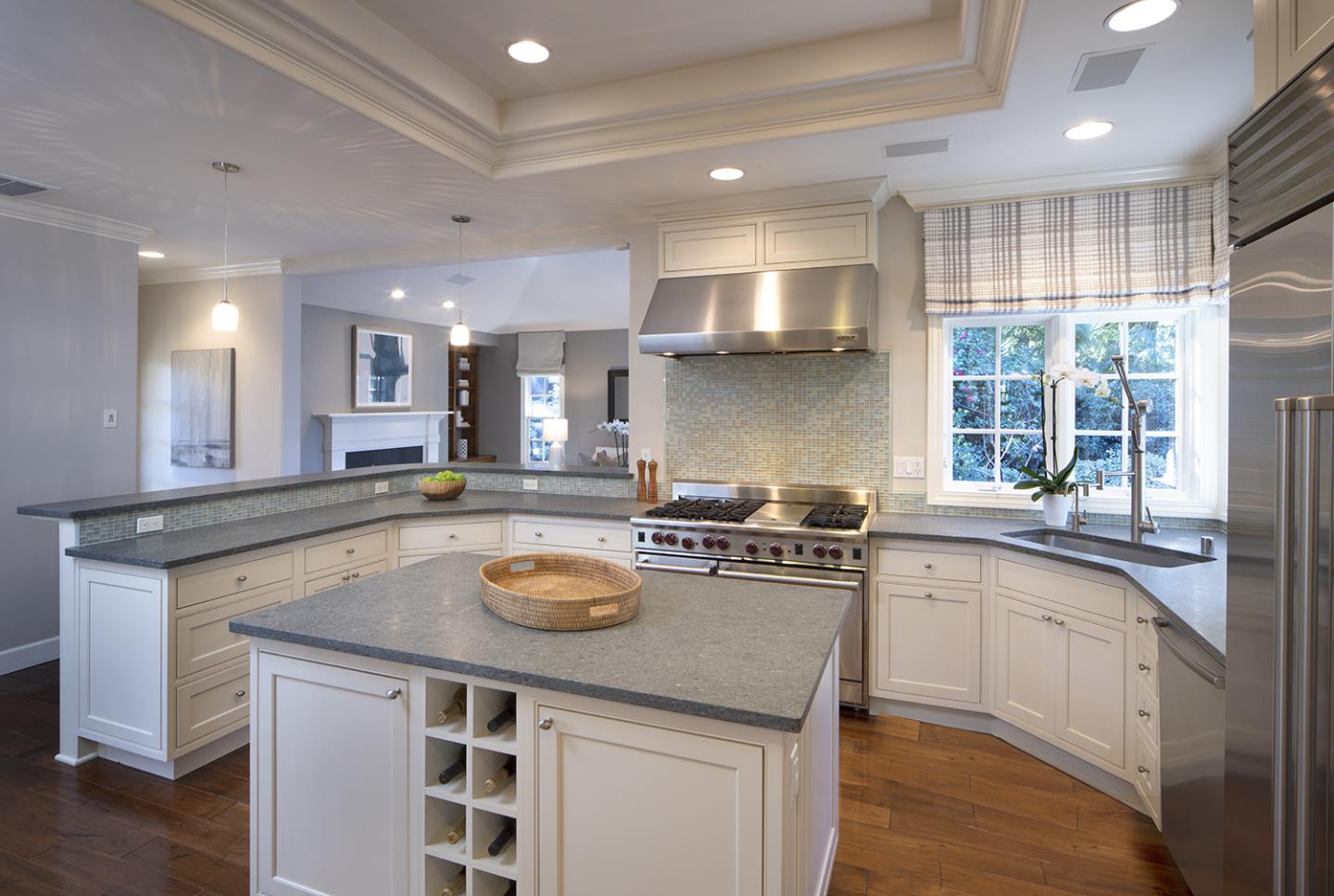 158 Seminary Drive Menlo Park, CA 94025 - Photo 7 of 23 a kitchen with a sink a stove cabinets and wooden floor