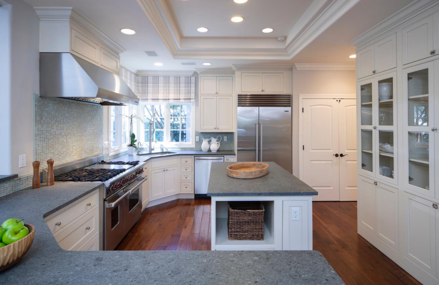 158 Seminary Drive Menlo Park, CA 94025 - Photo 8 of 23 a kitchen with stainless steel appliances granite countertop a stove a sink and a refrigerator