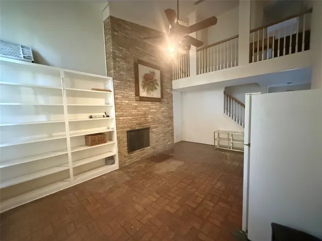a view of a livingroom with a staircase
