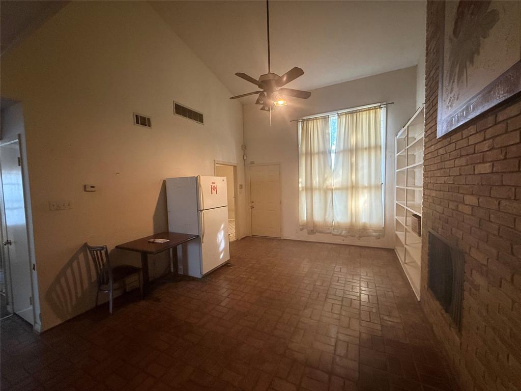 13329 Southview Lane Dallas, TX 75240 - Photo 7 of 17 a view of a livingroom with furniture and windows