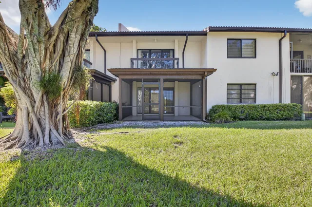 a bathroom with a shower and a toilet