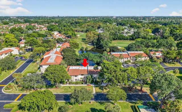 an aerial view of a house with a garden