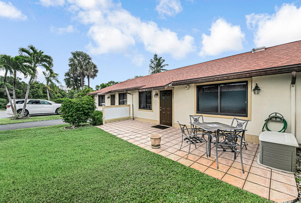 a view of a house with patio