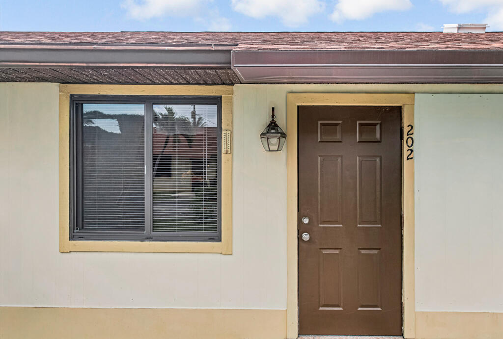 815 Andrew Redding Road, Unit 202 Lantana, FL 33462 - Photo 29 of 30 a view of front door