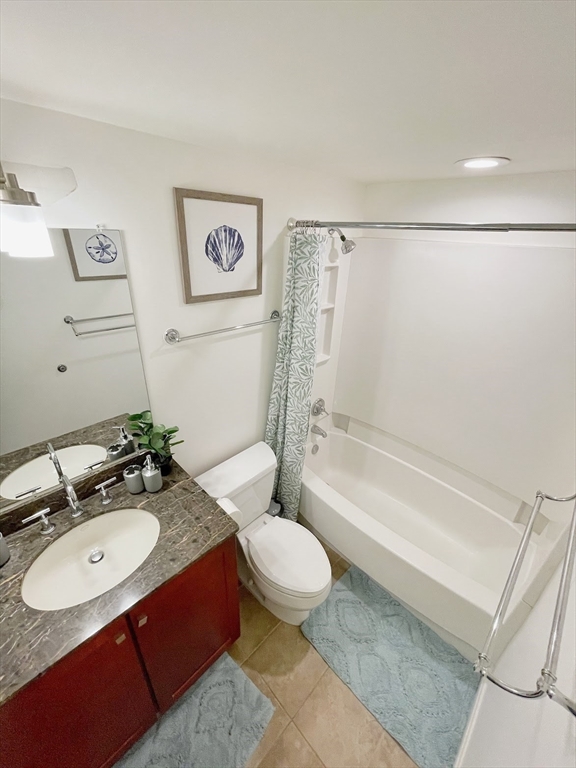 10 Museum Way, Unit 321 Cambridge, MA 02141 - Photo 15 of 15 a bathroom with a sink a toilet and shower