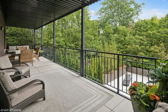 a balcony with chairs