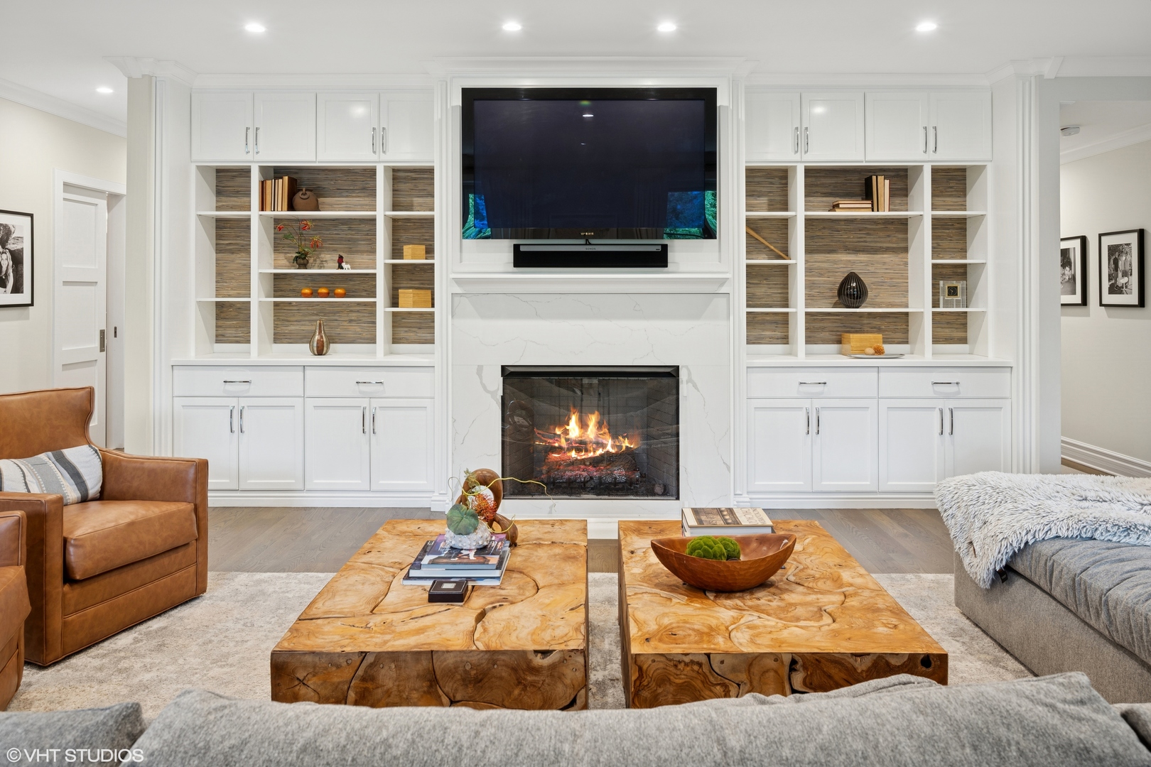 1851 North Halsted Street, Unit 2 Chicago, IL 60614 - Photo 3 of 31 a living room with furniture a flat screen tv and a fireplace