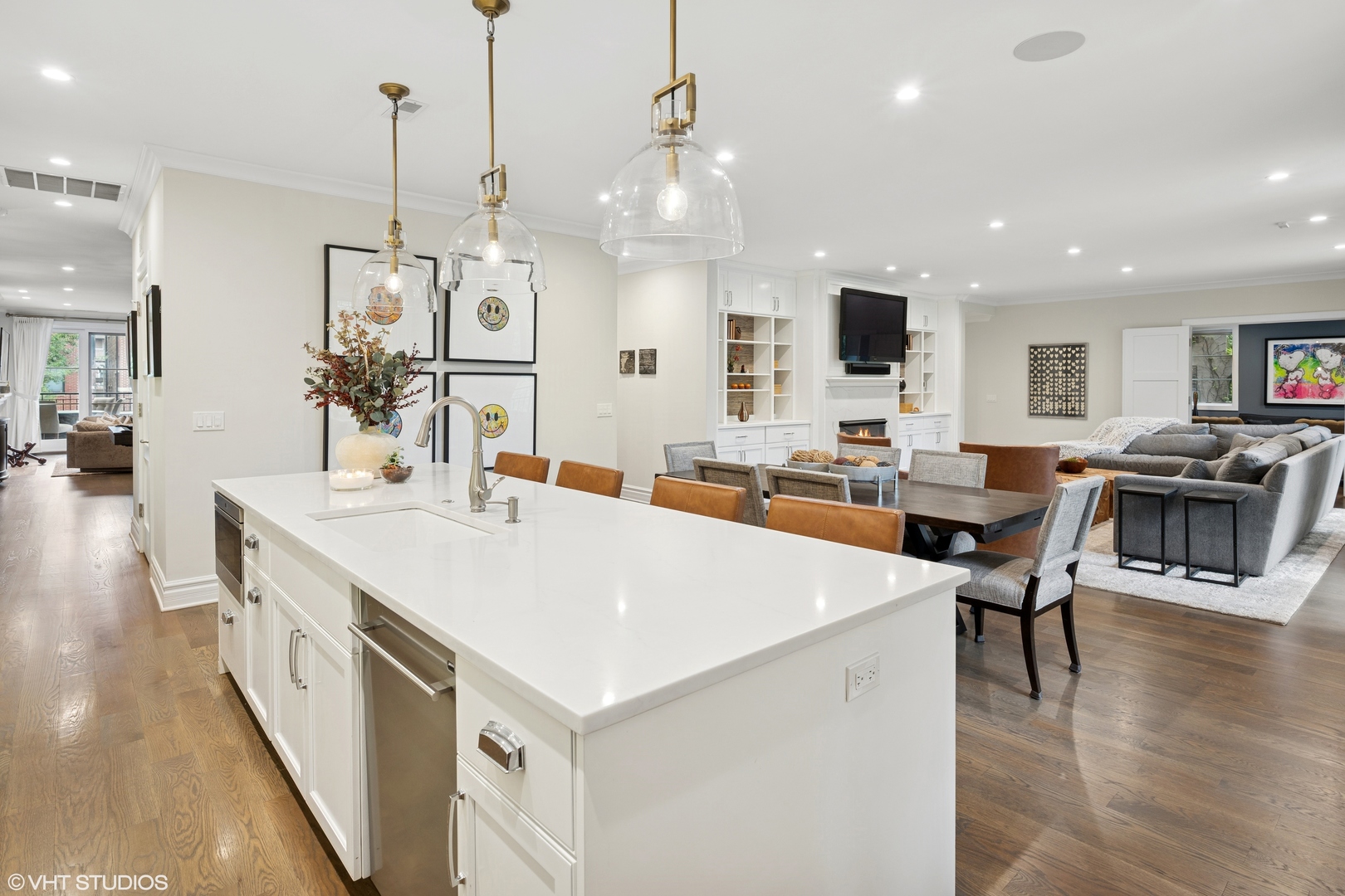 1851 North Halsted Street, Unit 2 Chicago, IL 60614 - Photo 7 of 31 a large white kitchen with lots of counter space and stainless steel appliances