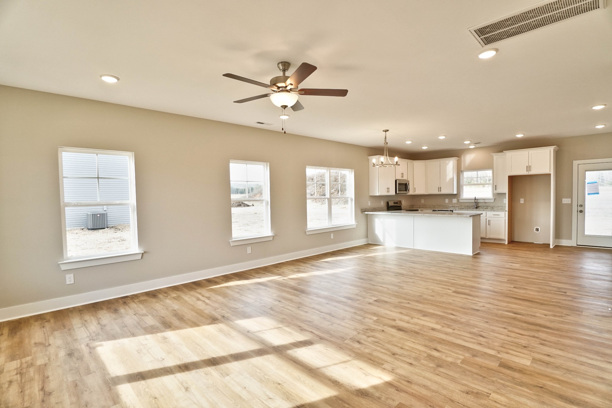 Wide open concept looking toward the eat-in area and kitchen.