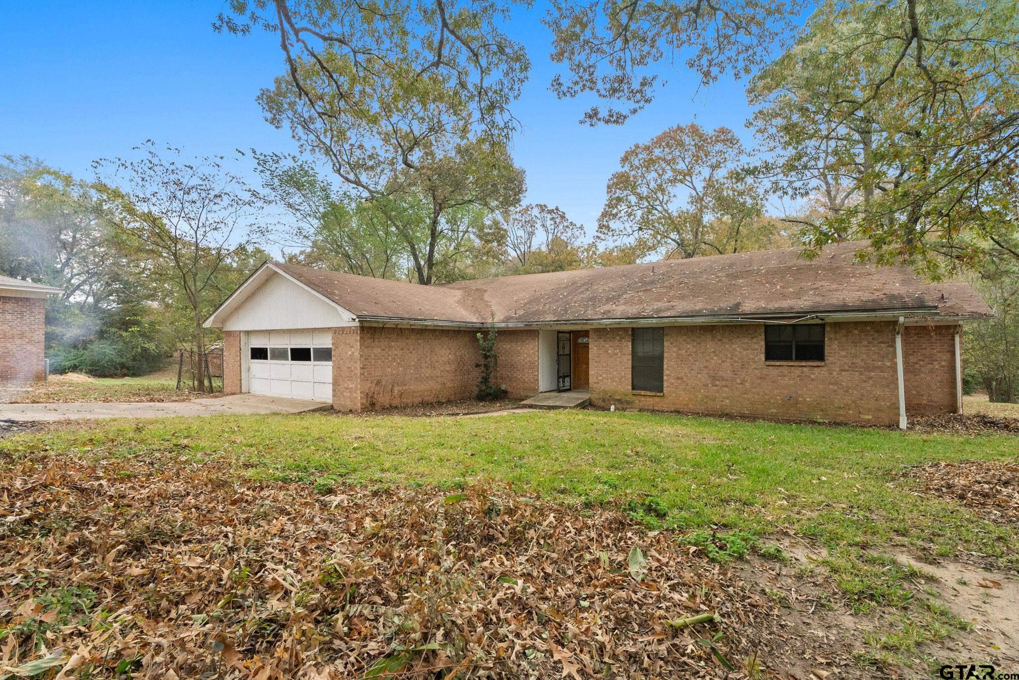 21135 County Road 1291 Flint, TX 75762 - Photo 11 of 25 a house view with a garden space